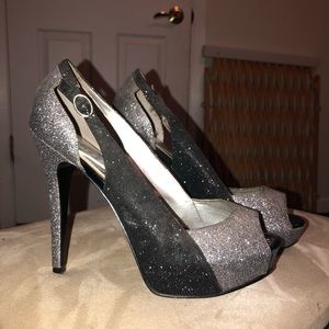 Black and sliver Guess heels.